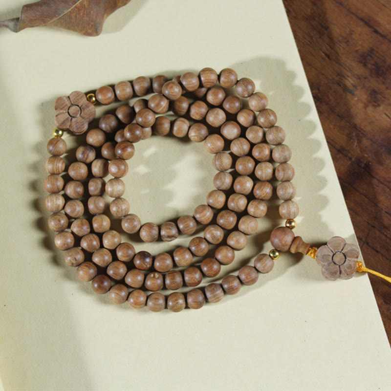 6mm Sandalwood Plum Blossom Charm Mala Bracelet for Calmness & Healing