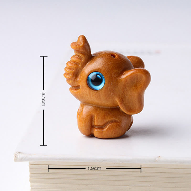 Mini Elephant Carved Decoration in Sandalwood for Protection & Luck