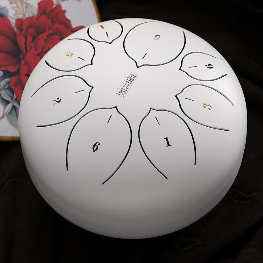White steel tongue drum with numbered zones, 8 tones, F key, carbon steel finish