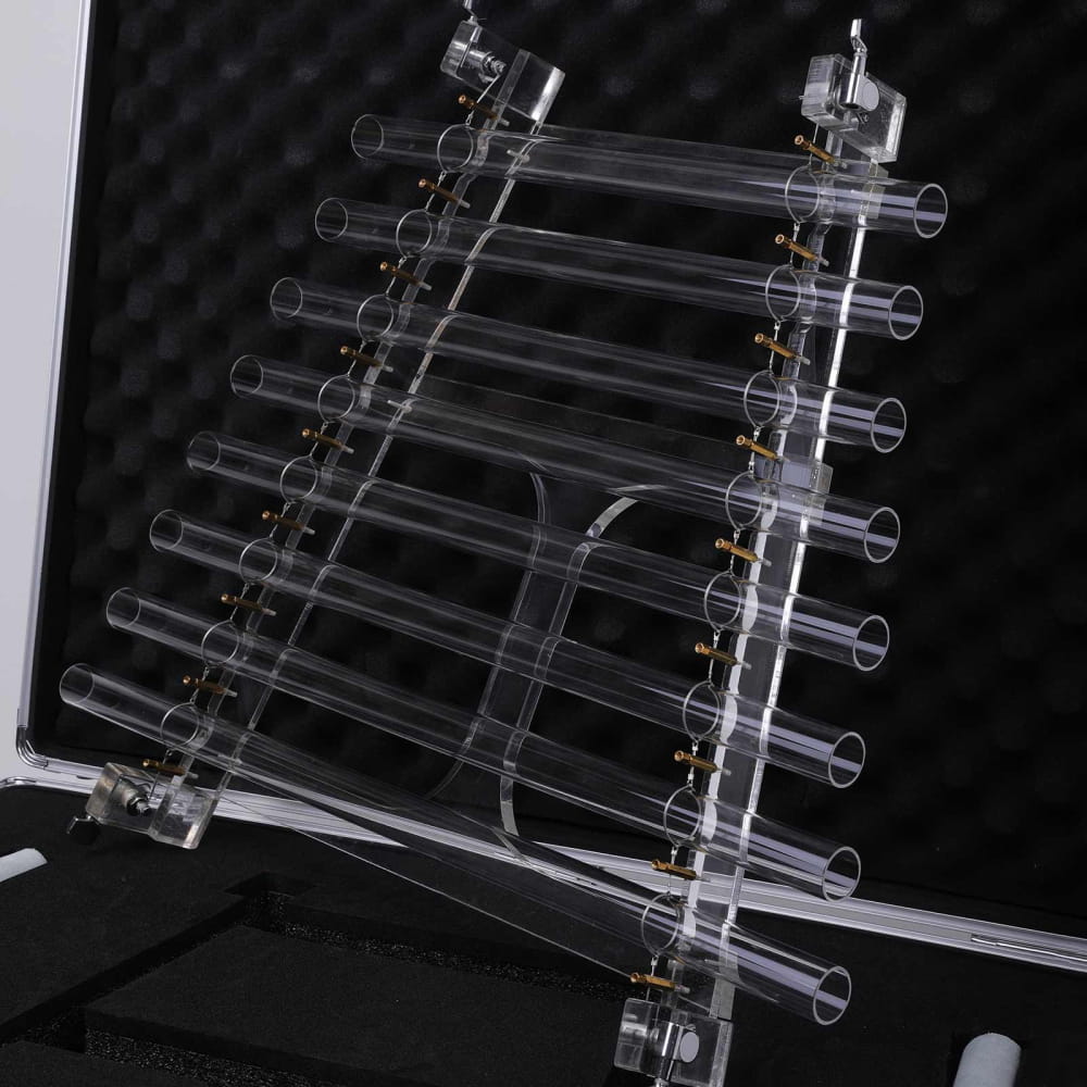 Clear glass test tube rack showcasing the 8-Note Quartz Crystal Singing Harp