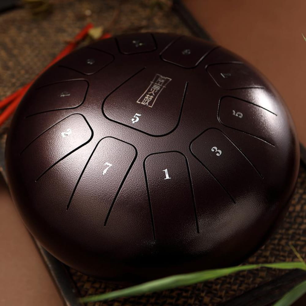 Dark metallic 8’’ Square Steel Tongue Drum with numbered sections in F Key