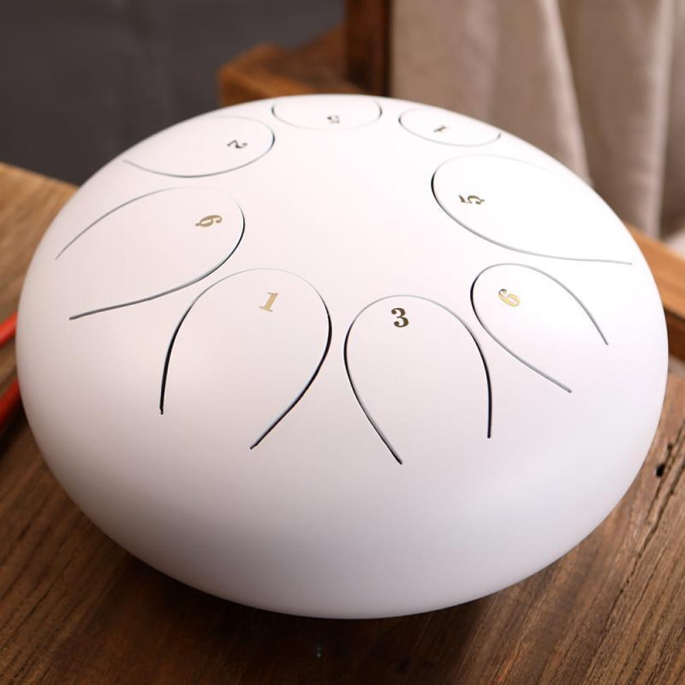 White Steel Tongue Drum with numbered zones on 10 Inch D Key instrument surface