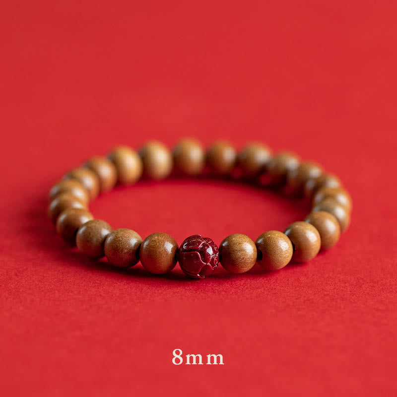 Peach Wood Cinnabar Lotus Bracelet for Luck & Wealth