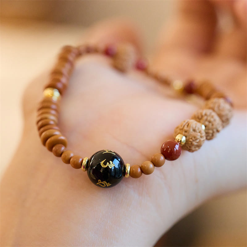 Om Mani Padme Hum Bracelet Bodhi Seed and Black Onyx