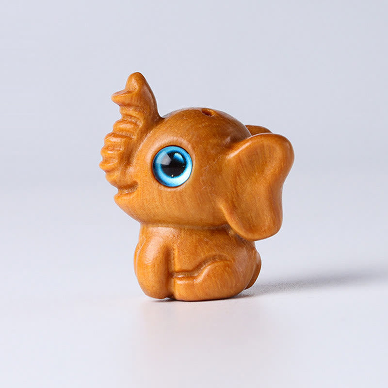 Mini Elephant Carved Decoration in Sandalwood for Protection & Luck