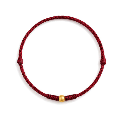 Handmade 999 Gold Mini Bead Red String Bracelet for Strength, on a white background