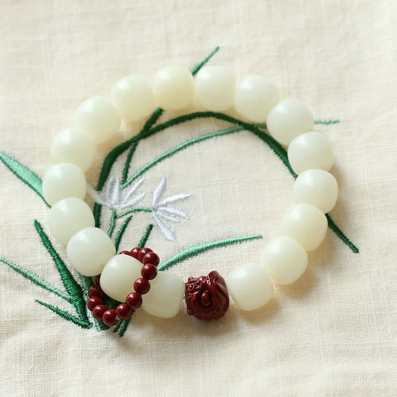 Natural Bodhi Seed Cinnabar Dancing Lion Charm Wrist Mala