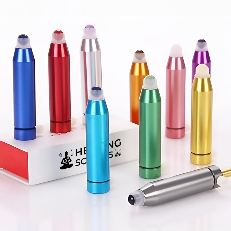 Colorful bullet-shaped aluminum massage rollers in metallic finishes for healing therapy