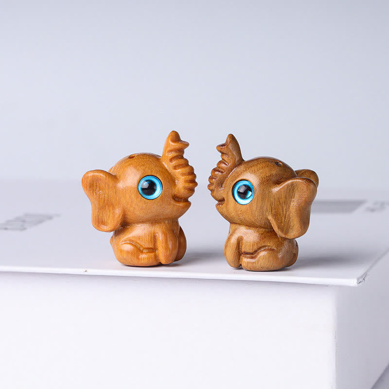 Mini Elephant Carved Decoration in Sandalwood for Protection & Luck