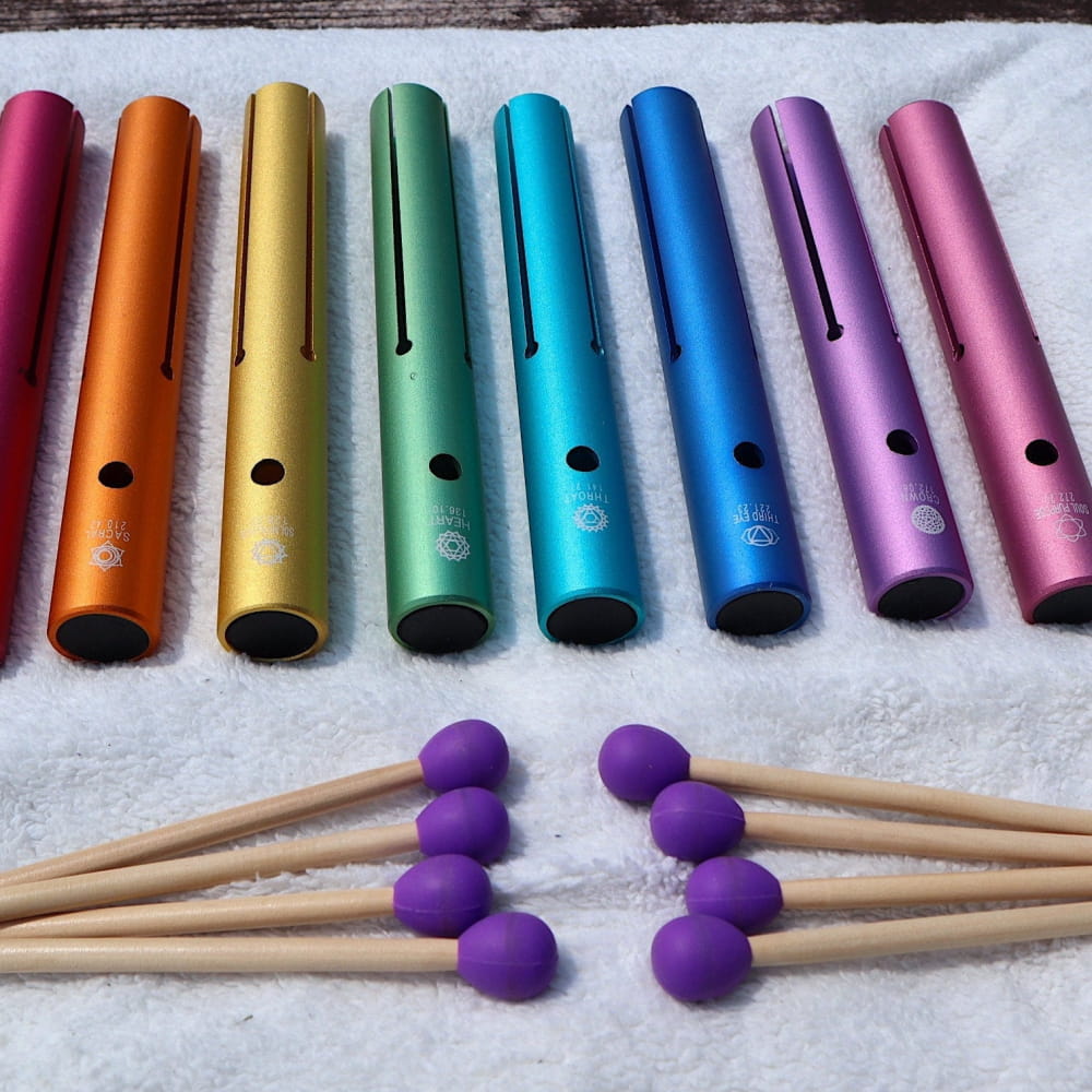 Rainbow Boomwhackers with purple mallets for Complete Chakra Solfeggio healing