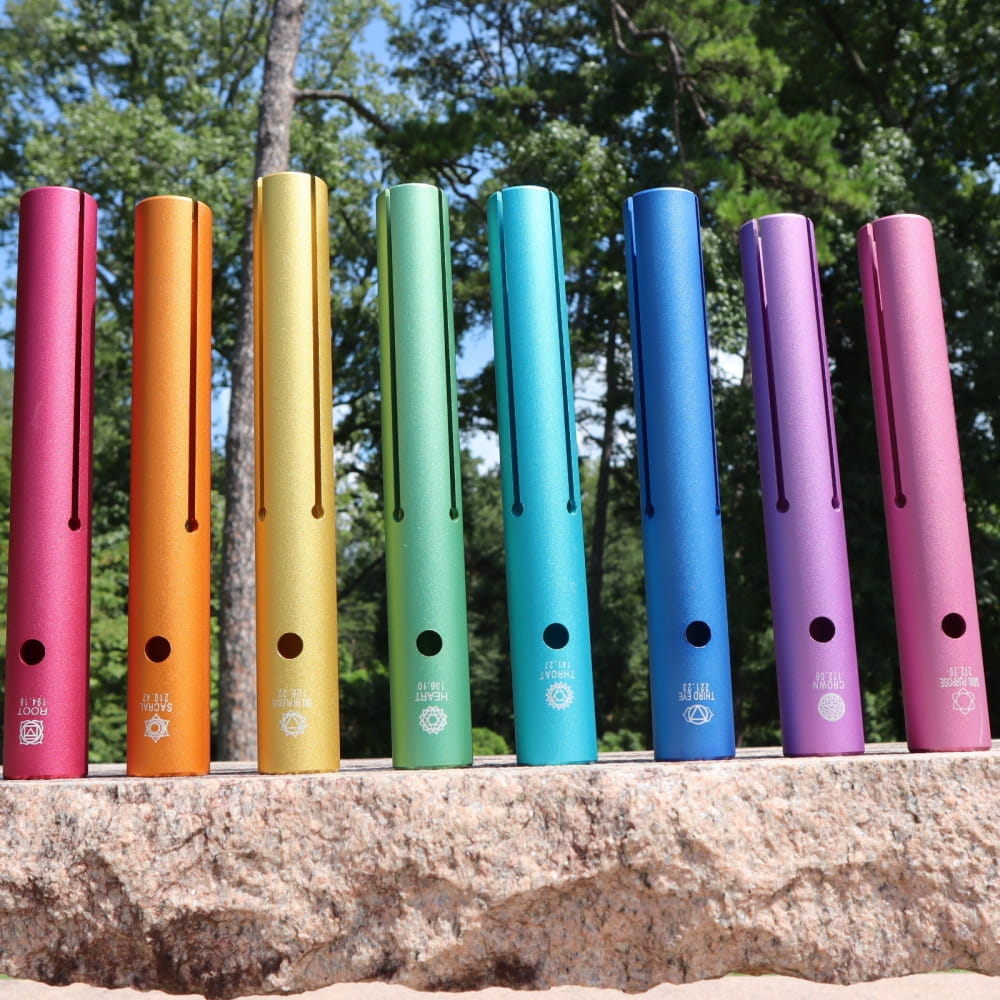Rainbow-colored musical pipes for healing in Complete Chakra Solfeggio Tubes