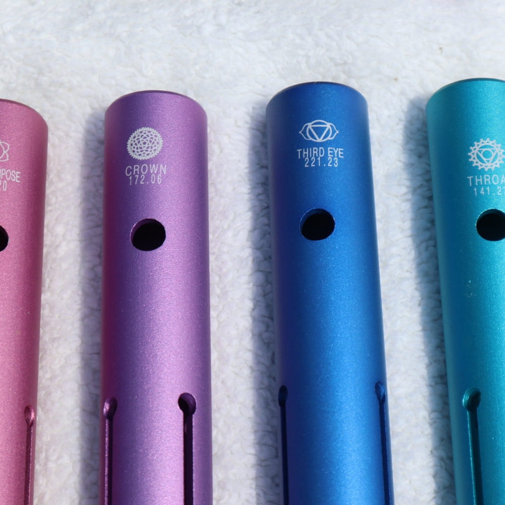 Colorful metal flute bodies with anodized finishes for Complete Chakra Solfeggio Tubes