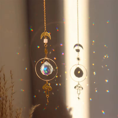 Crystal Butterfly Wind Chime featuring gold moon and celestial accents for outdoor decor