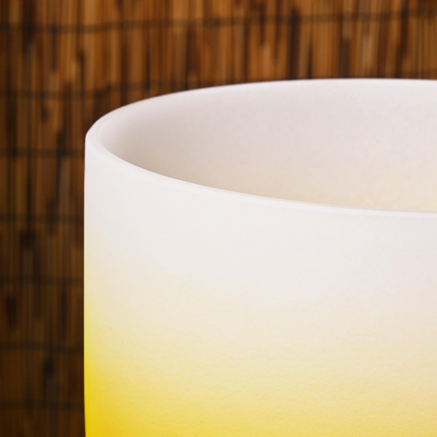 White ceramic cup with yellow gradient for Crystal Singing Bowl Solar Plexus healing