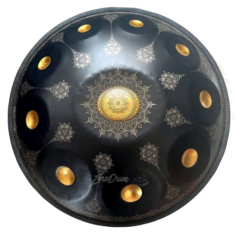 Circular black D Minor Kurd Handpan Drum with mandala patterns and golden moon phases
