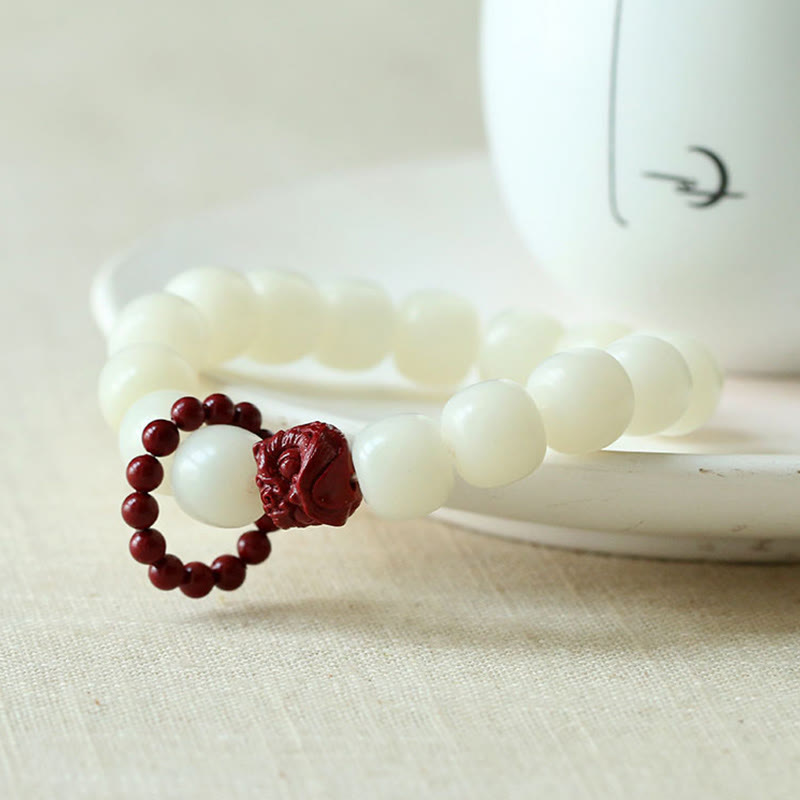 Natural Bodhi Seed Cinnabar Dancing Lion Charm Wrist Mala