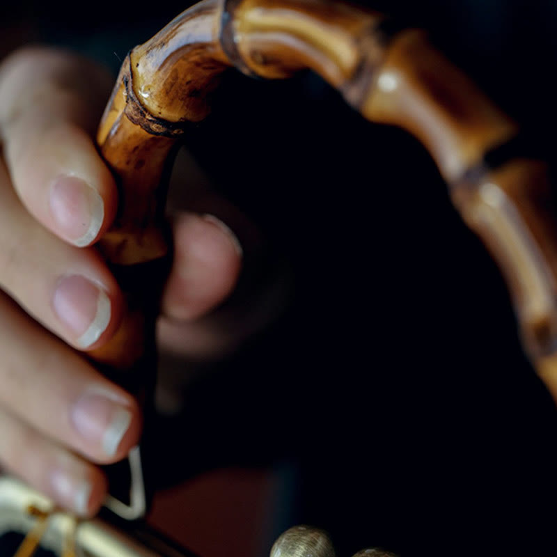 Nature-Inspired Bamboo Handle Bag with Leaves and Bird Design