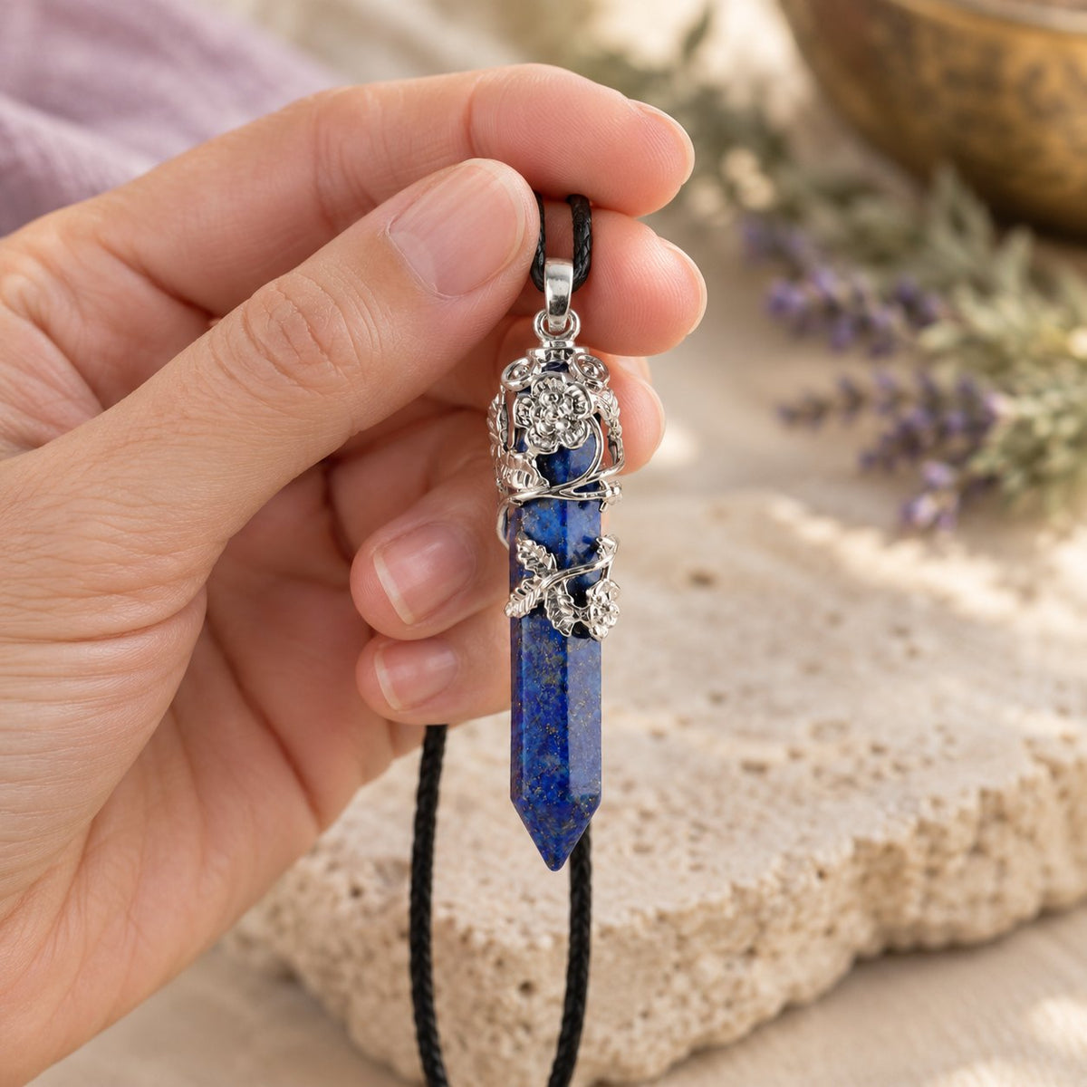Healing Lapis Lazuli Silver Crystal Point Pendant, held in the hand to show its real size