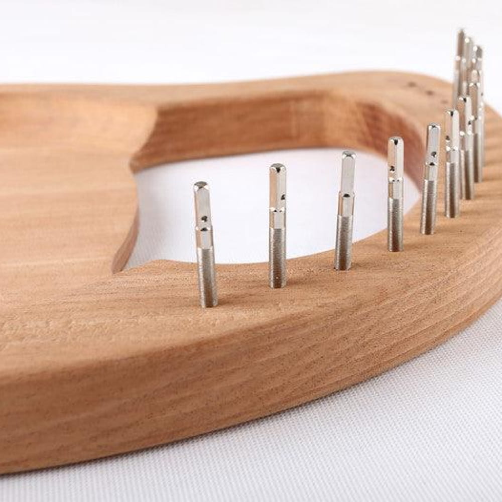 Wooden Kalimba with metal tines showcased in Lyre Harp Instrument with tuning pins