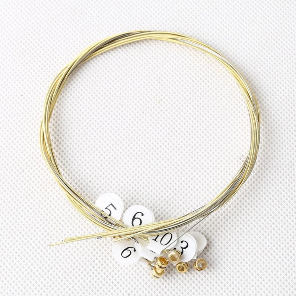 Gold coiled guitar string with number tags for Lyre Harp Strings instrument