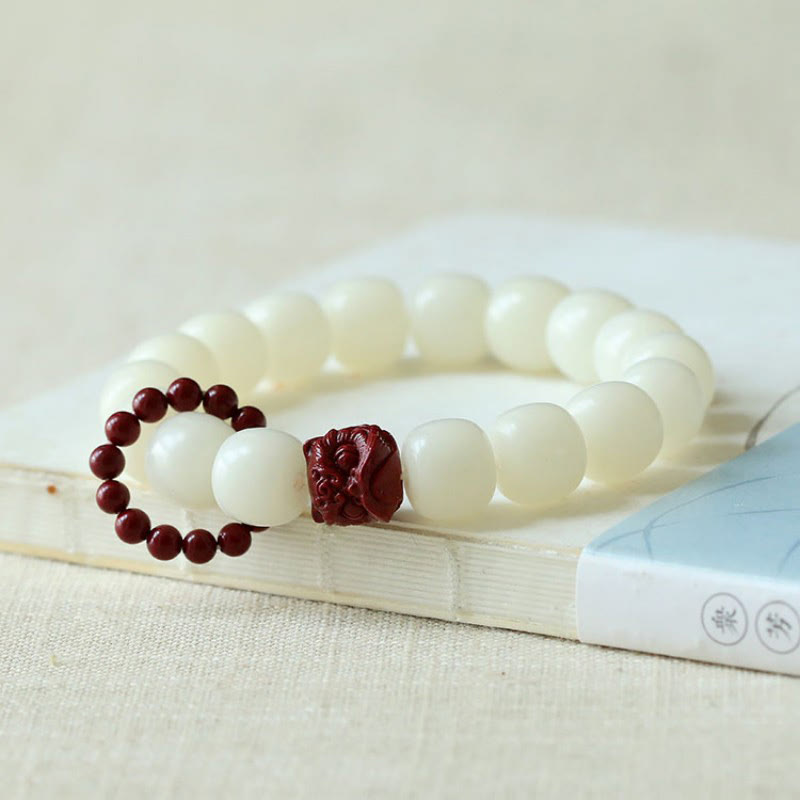 Natural Bodhi Seed Cinnabar Dancing Lion Charm Wrist Mala