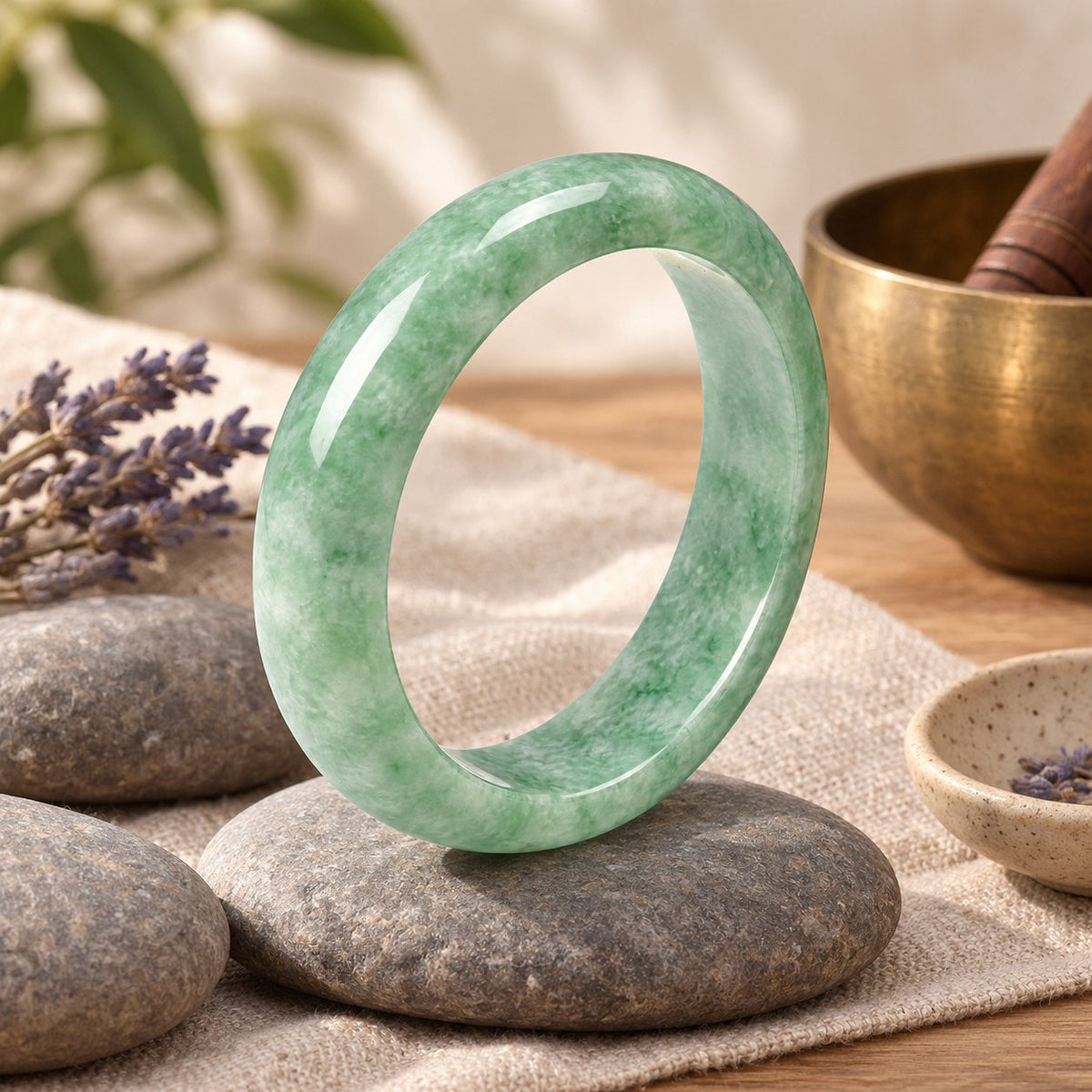 Natural Jade Prosperity Bangle Bracelet 60-61mm, styled with a singing bowl and lavender