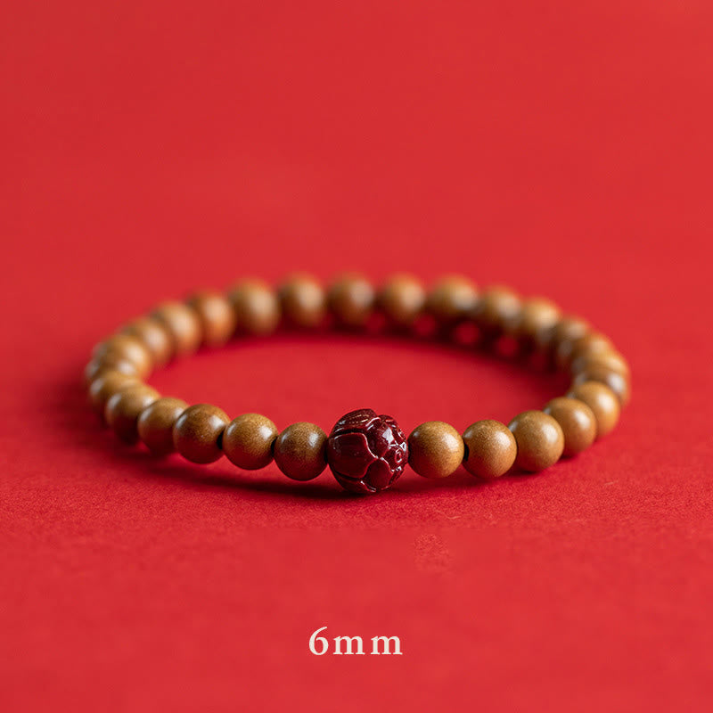 Peach Wood Cinnabar Lotus Bracelet for Luck & Wealth