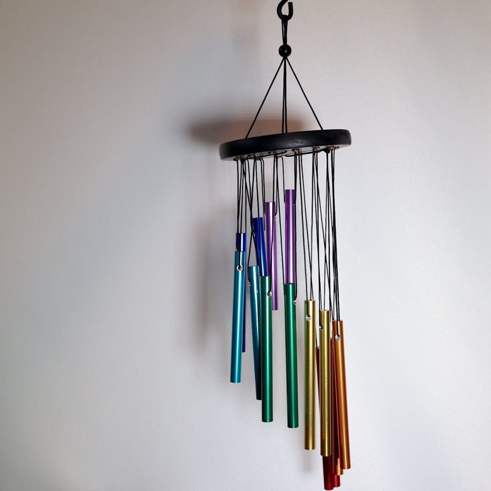 Rainbow-colored wind chimes with metal tubes for natural melodies and sound vibration