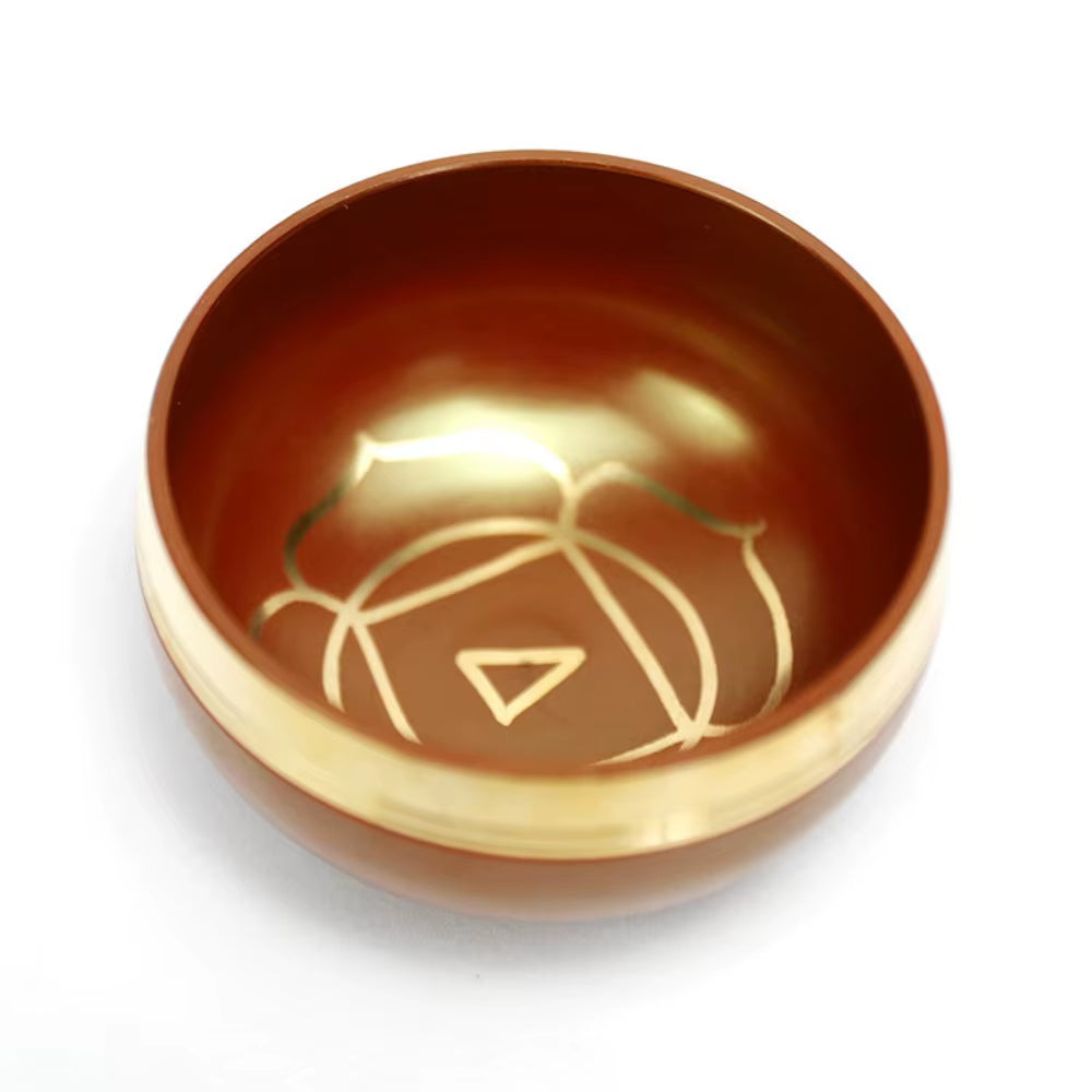 Brown ceramic Tibetan Singing Bowl with geometric designs for meditation and healing