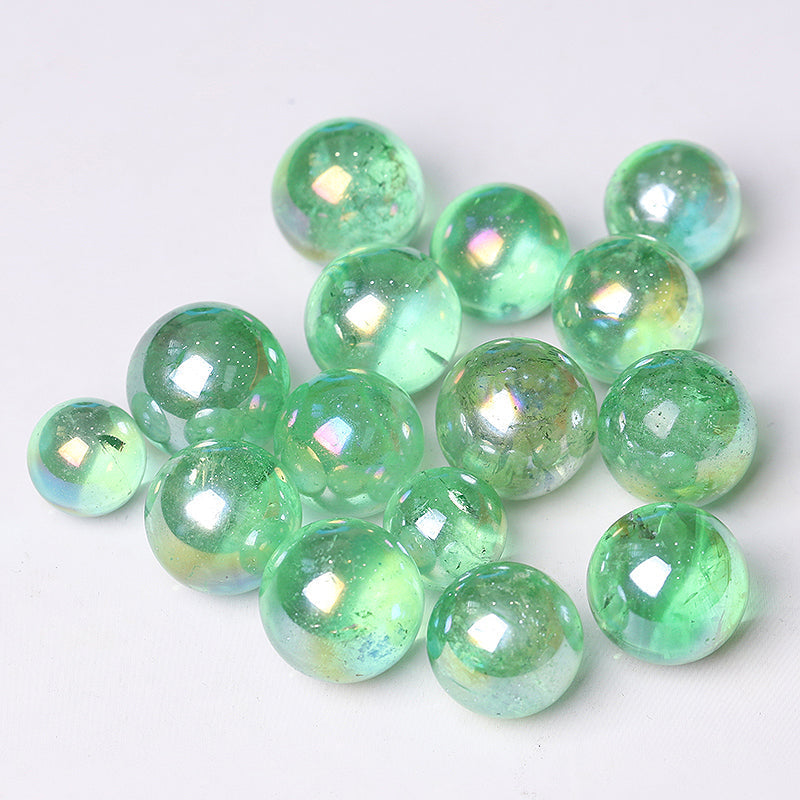 Clear light-green iridescent glass marbles from Aura Green Crystal Sphere Healing Orb