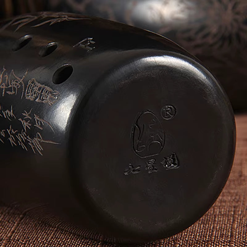 Black ceramic vessel with engraved Chinese characters on 10-Hole Ceramic Xun F Key