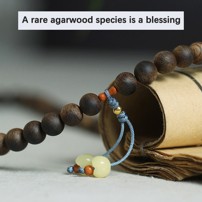108 Bead Mala Meditation Bracelet with Agarwood Cyan Jade Amber