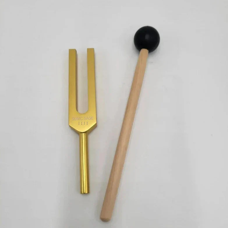 Golden tuning fork with wooden mallet for 1111 Hz Sonic Sage Healing