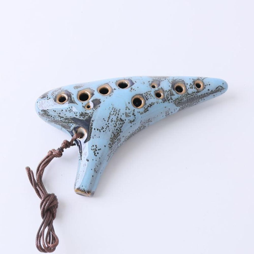 Light blue 12 Hole Alto C Metal Style Ocarina with brown cord and finger holes