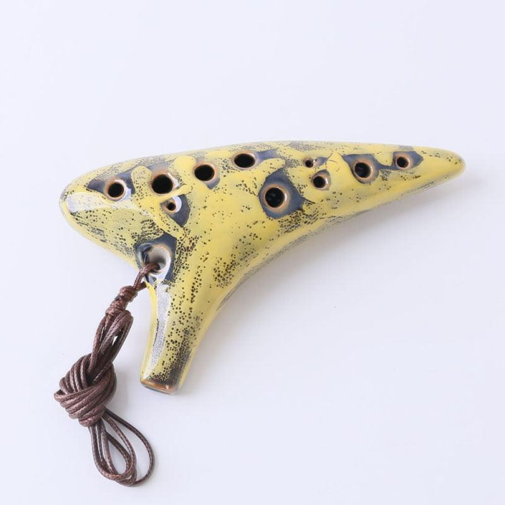 Yellow ceramic 12 Hole Alto C Metal Style Ocarina with brown cord and finger holes