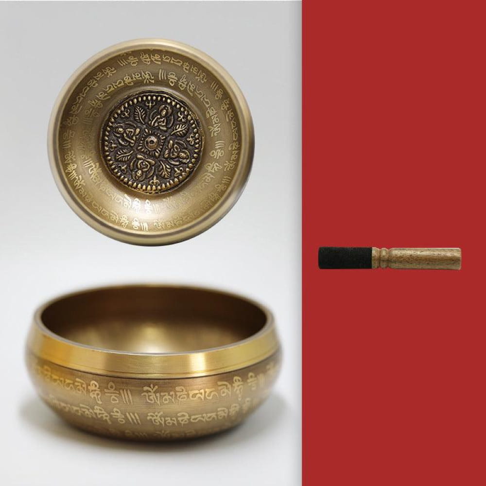 Tibetan Singing Bowl with ornate designs and Buddhist symbols for meditation use