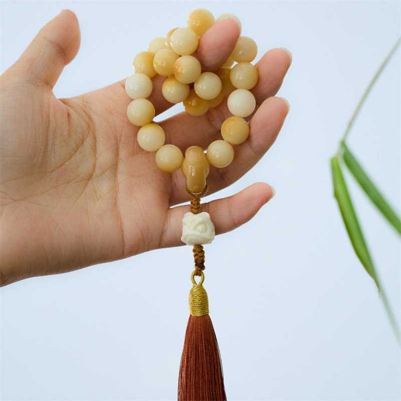 12mm Bodhi Seed Wrist Mala with Dancing Lion Charm for Harmony