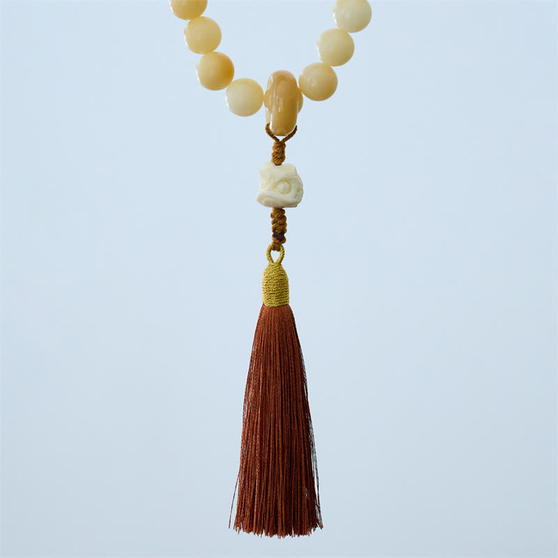 12mm Bodhi Seed Wrist Mala with Dancing Lion Charm for Harmony