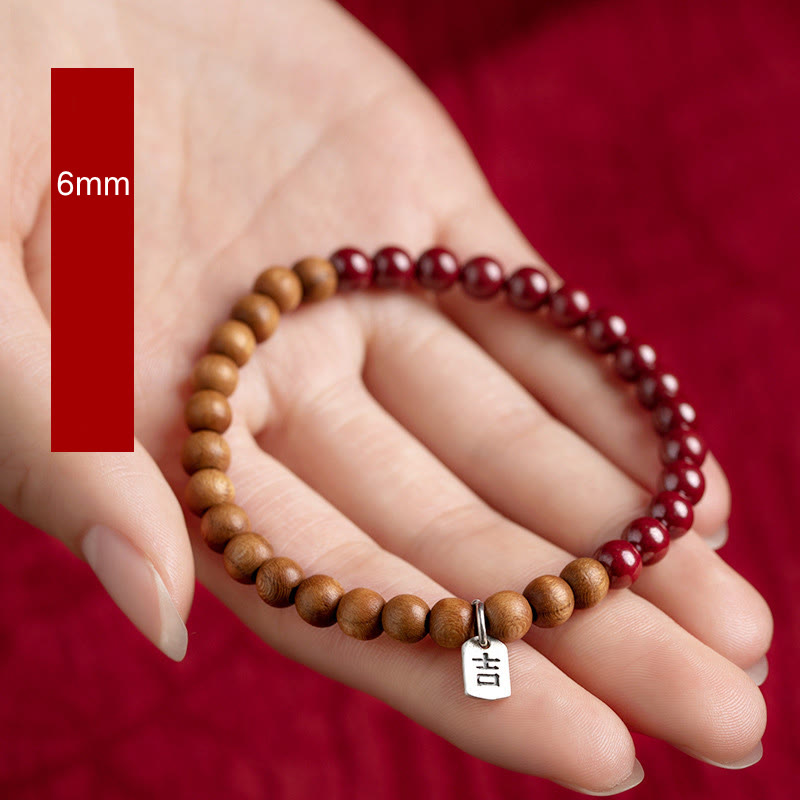 6mm Cinnabar Bracelet with Peach Wood & Sterling Silver Protection