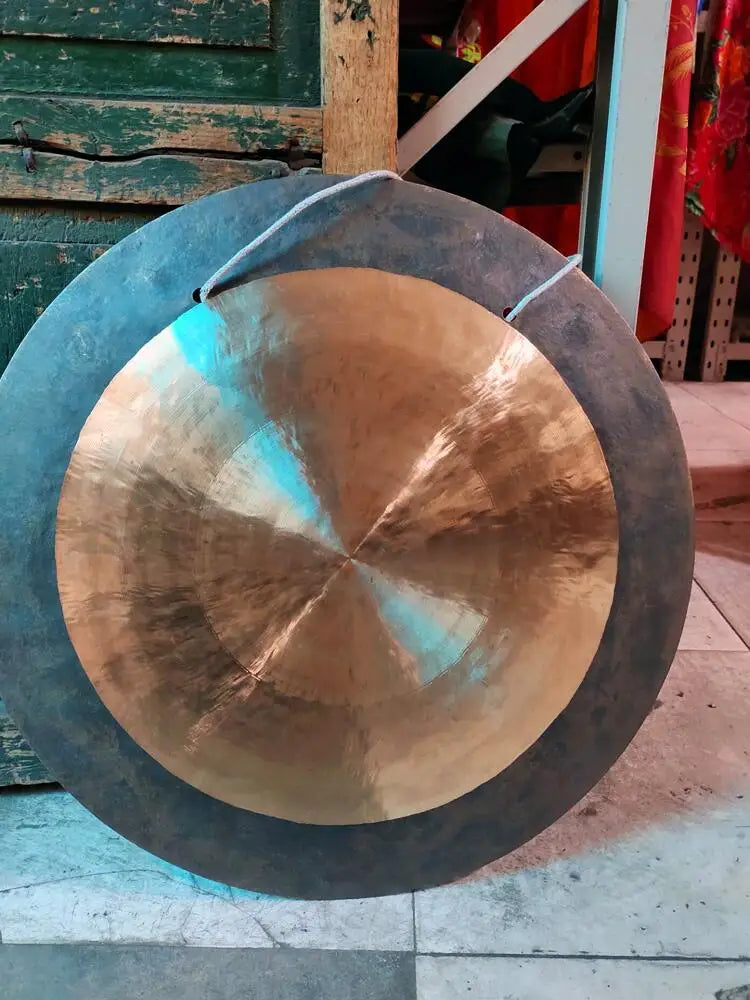 14-inch Deep Wave Gong Instrument with a brushed metallic surface for sound healing