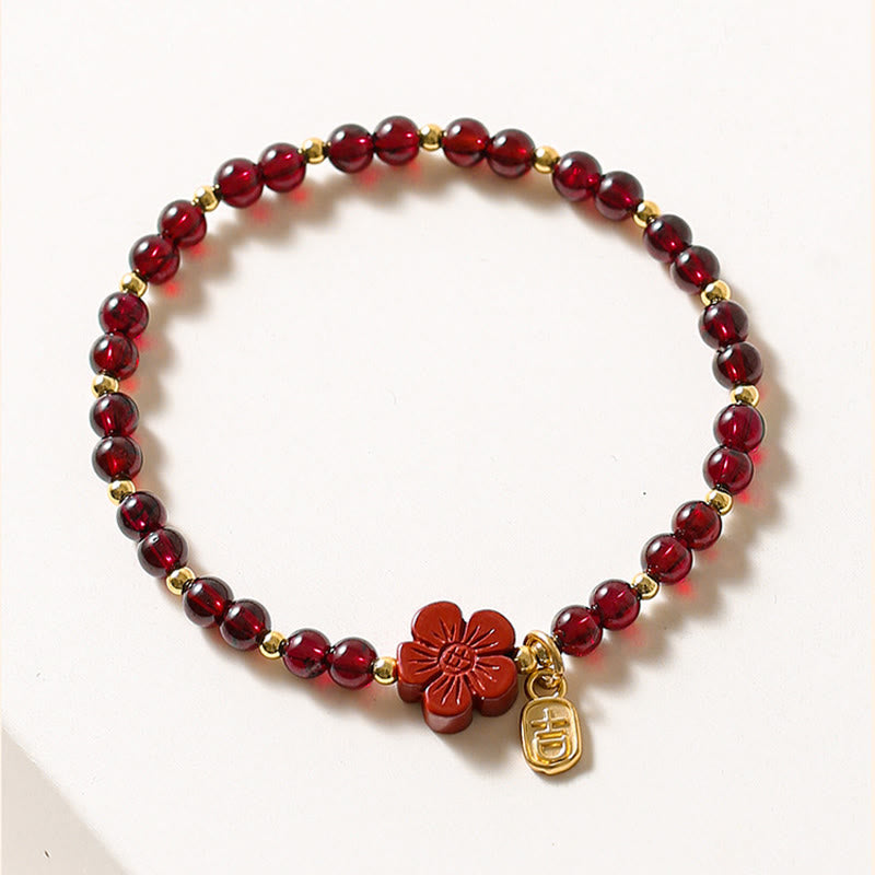 14K Gold Garnet Cinnabar Flower Calm Bracelet