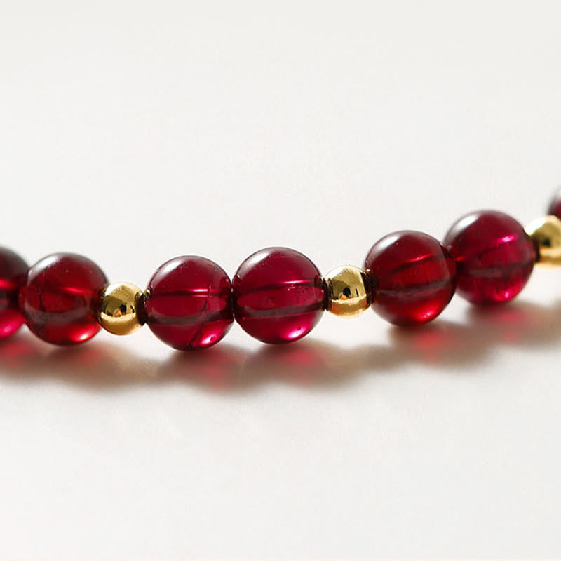 14K Gold Garnet Cinnabar Flower Calm Bracelet