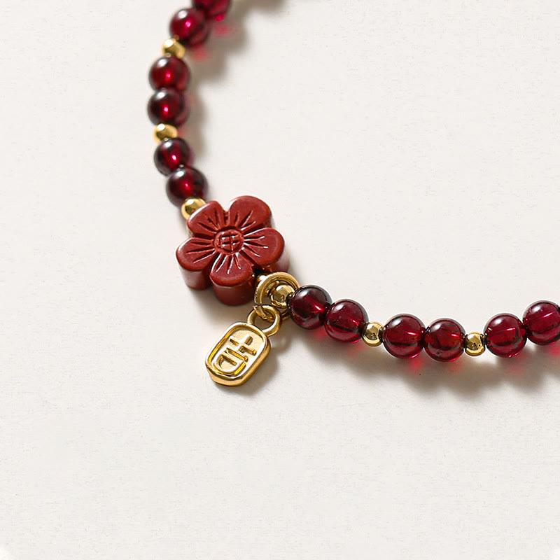14K Gold Garnet Cinnabar Flower Calm Bracelet