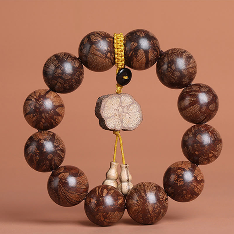 15mm Plum Blossom Wood Inner Peace Bracelet