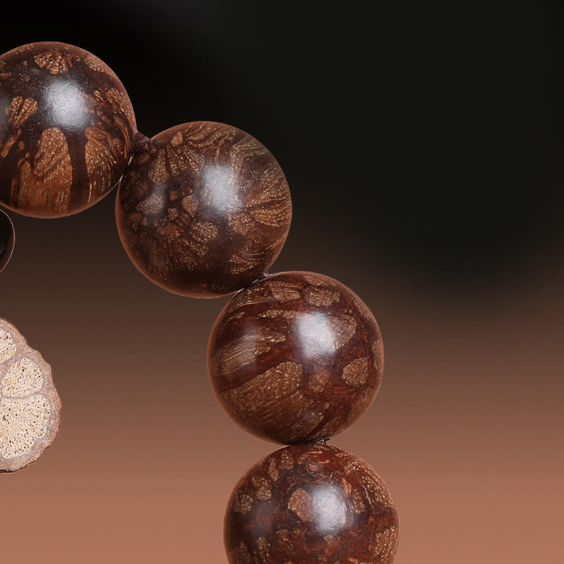 15mm Plum Blossom Wood Inner Peace Bracelet