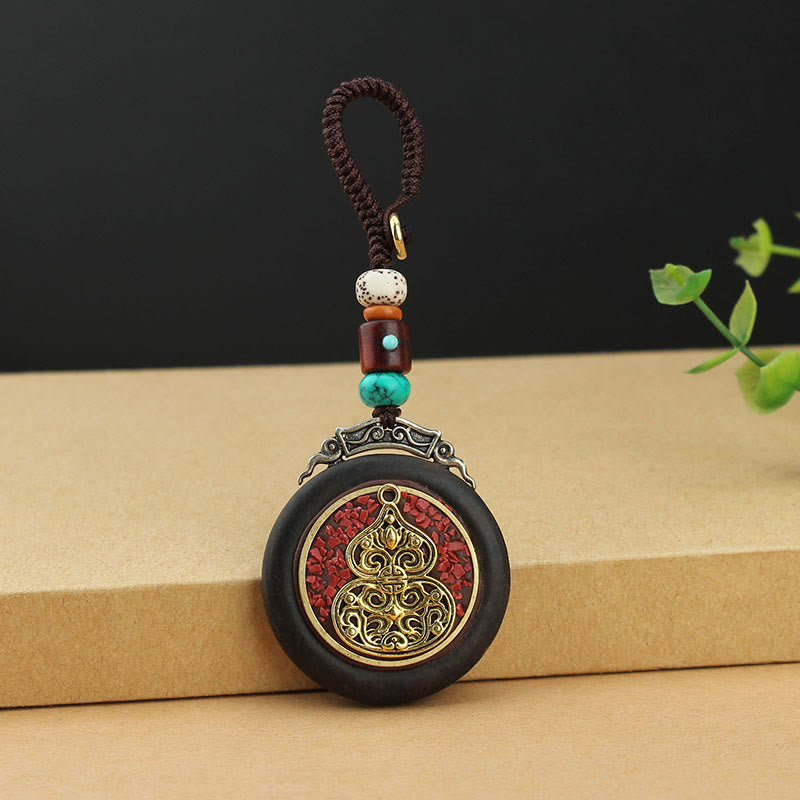 Tibetan Ebony Wood Peace Key Chain with Om Mani Padme Hum Symbol