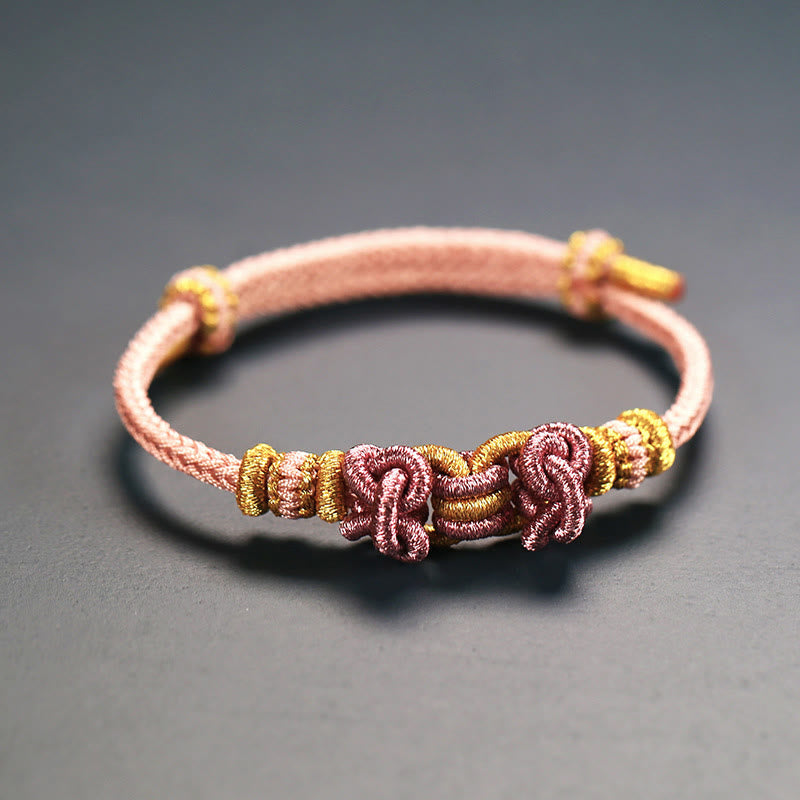 Unisex Red String Saddle Knot Strength Bracelet