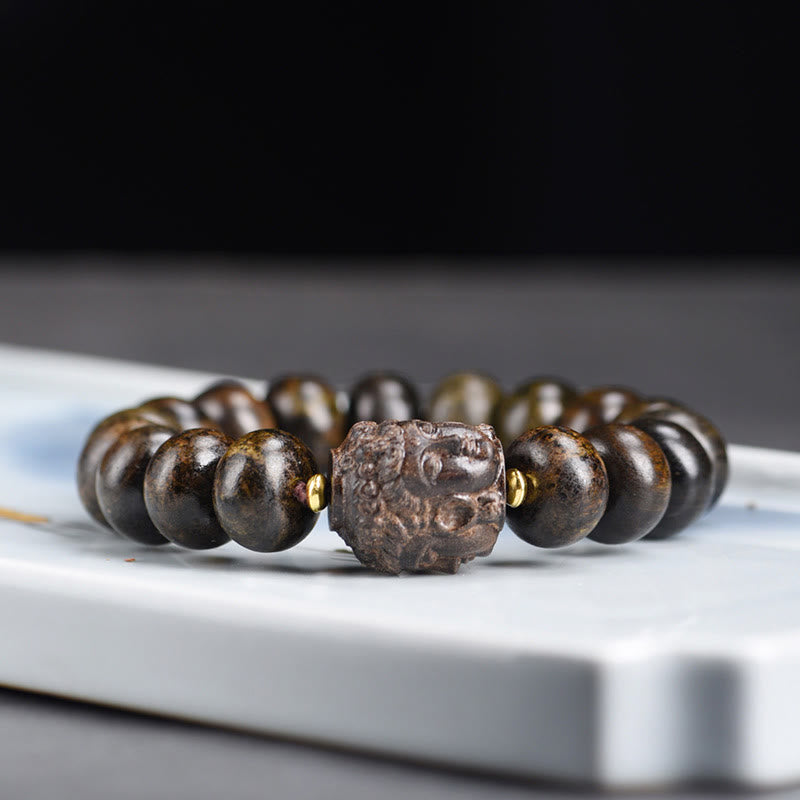 Tibetan Wood Buddha Bracelet | Serenity & Compassion