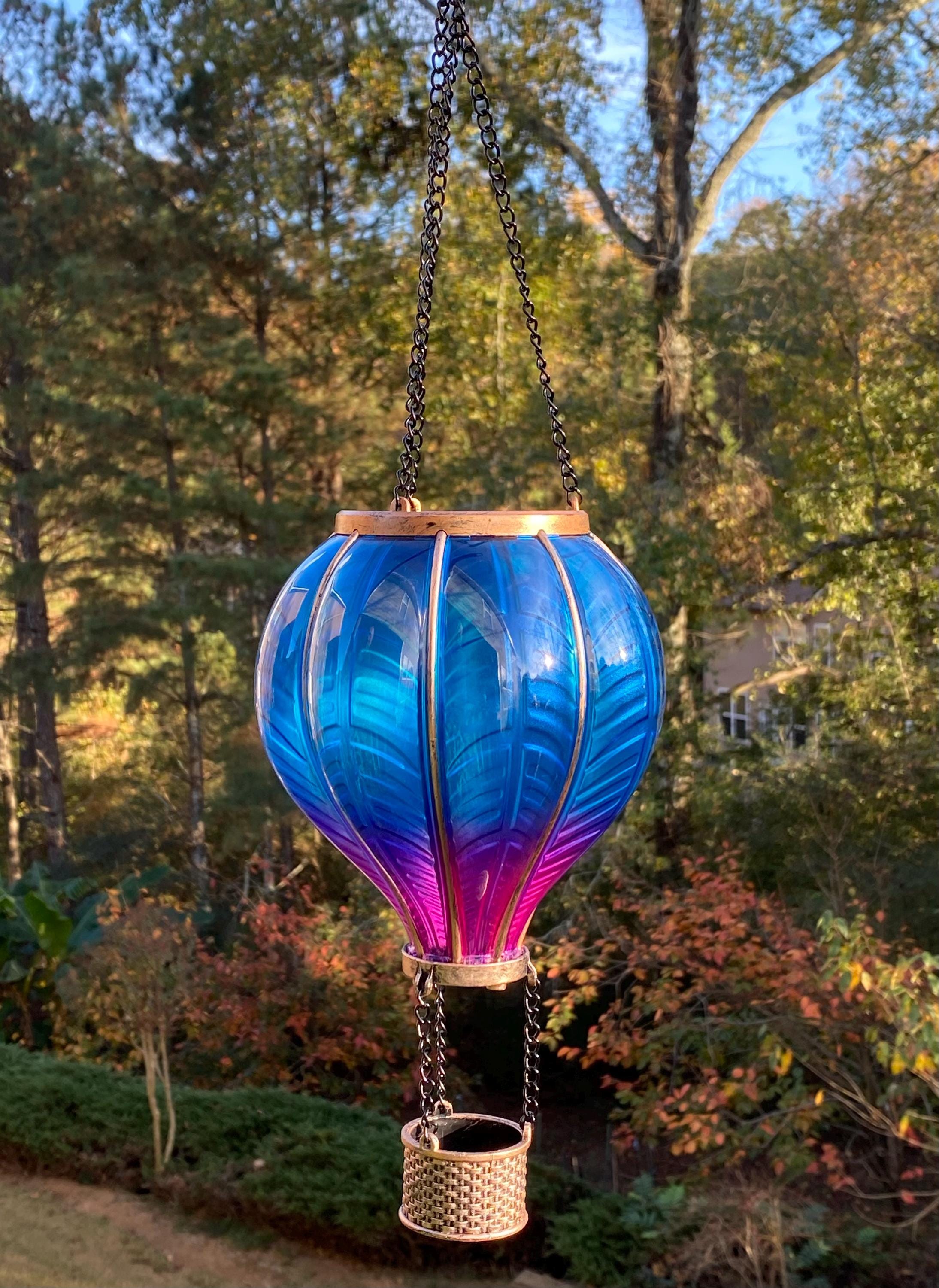 Blue and pink glass hot air balloon ornament with metallic basket for garden décor