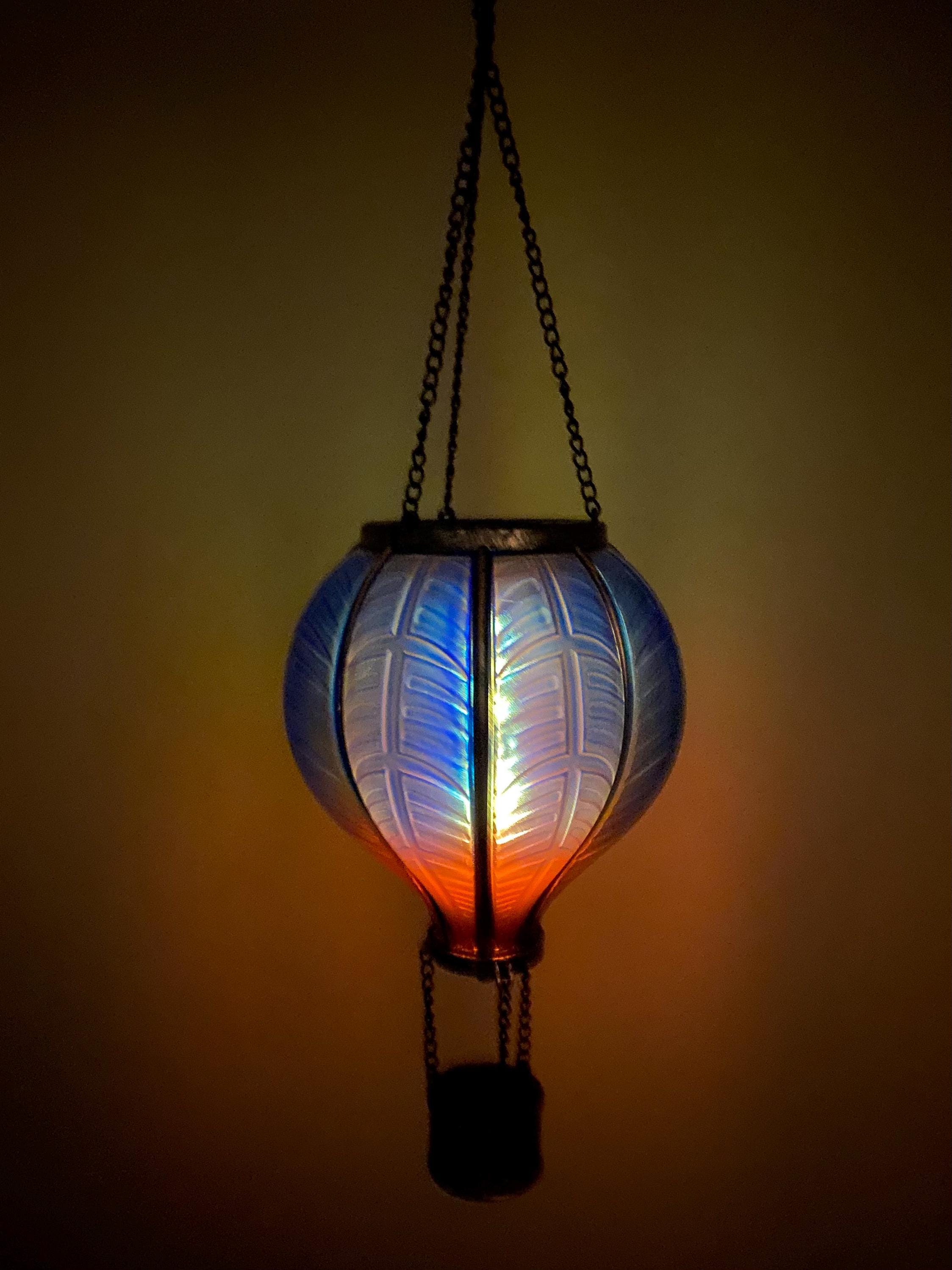 Illuminated hot air balloon lantern in blue and orange for garden décor